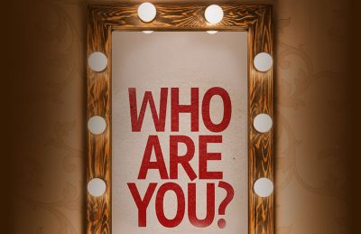 Vanity Mirror with "Who Are You?" Written on it